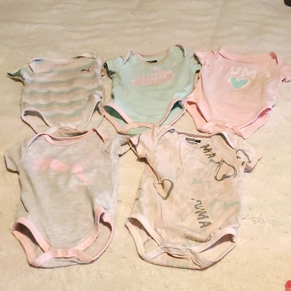 5 Puma Onesies. 3 snap bottoms. 3/6 months.